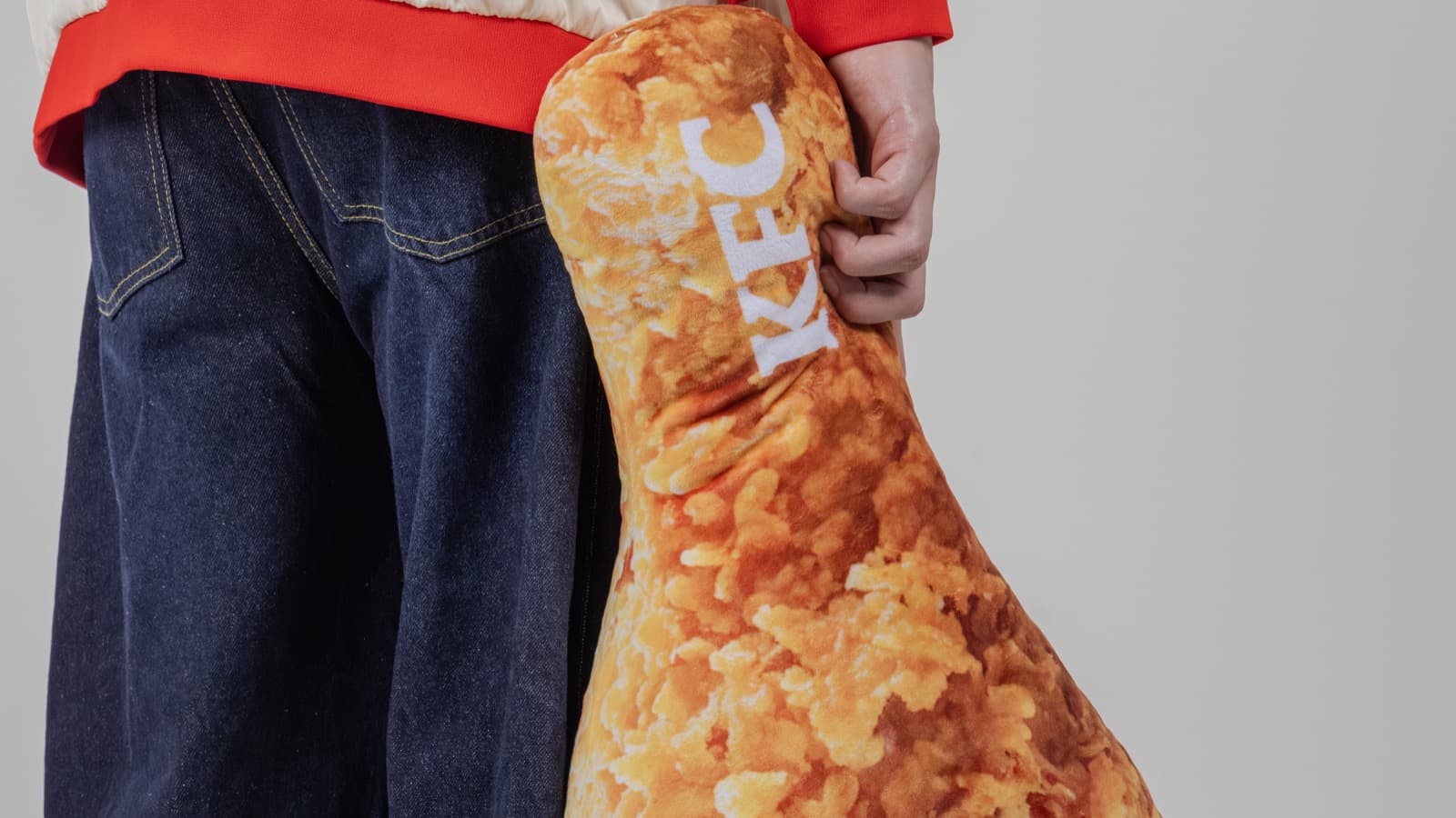 KFC Singapore's First 'SWAGS' Merch Line Is Live — Drumstick Plushie $23.90 (Already Sold Out), Bucket Bag $15.90, Jacket $65.90 (From 1 Aug 2026)
