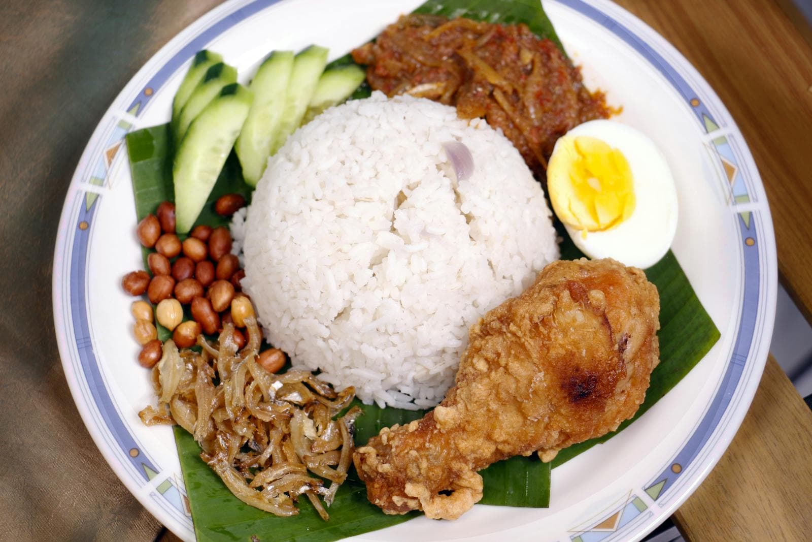 10 Best Nasi Lemak in Singapore (2026): S$4 Hawker Plates to S$26 Atas Ones, and The Coconut Club's S$9 Plate Is Gone