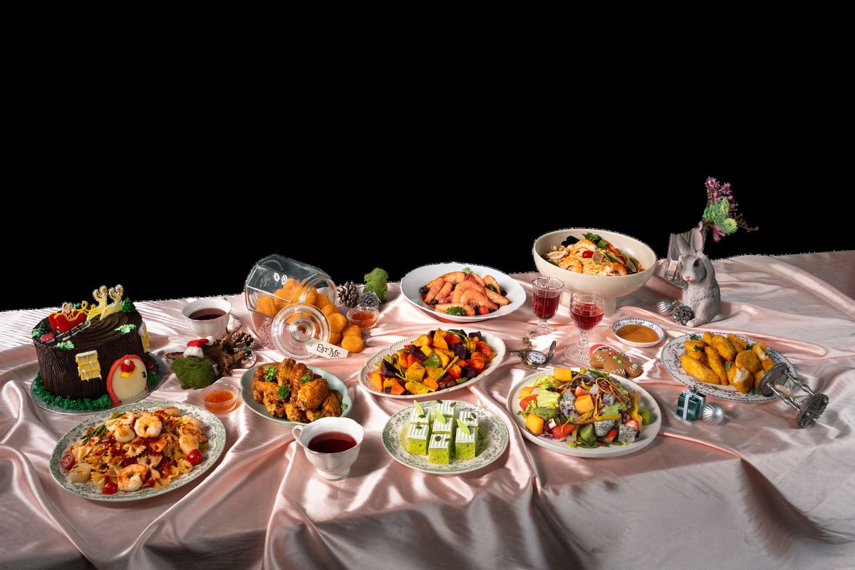 A Deli Hub Christmas party spread with yule log, roasts and festive sides.