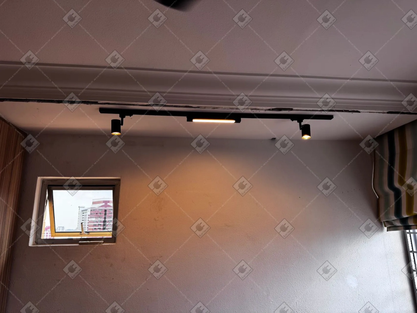 Mr Electrician: a 24-hour line, a UEN you can look up, and a pricing guide that is the market's rates rather than its own